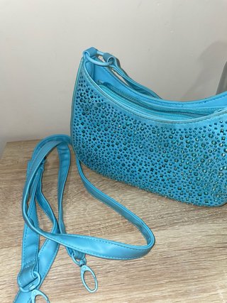 Bolso azul con pedrería