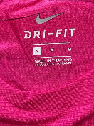 Conjunto deportivo Nike running rosa