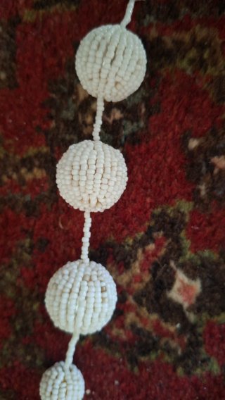 Collana rivestita da corallini