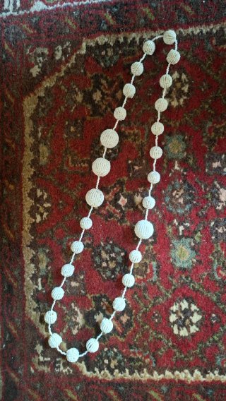 Collana rivestita da corallini