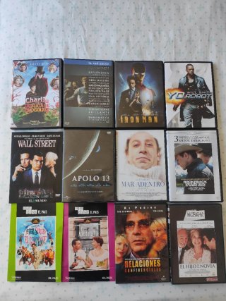 Lote  54 Películas Dvd + Reproductor portatil