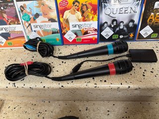 Lote Singstar PS2: 4 Juegos + 2 Micrófonos