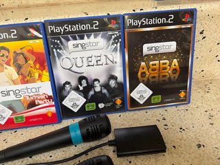 Lote Singstar PS2: 4 Juegos + 2 Micrófonos