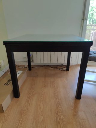 Mesa comedor extensible con cristal y madera negra