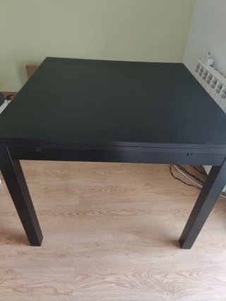 Mesa comedor extensible con cristal y madera negra