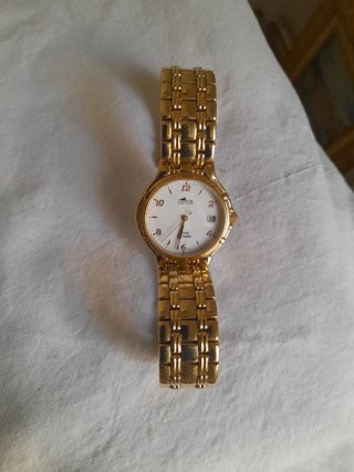 Reloj Lotus Chapado en Oro
