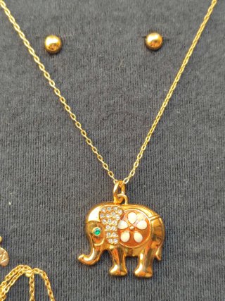 Conjunto collar elefante y pendientes