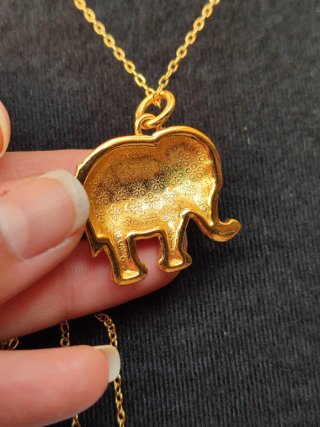 Conjunto collar elefante y pendientes