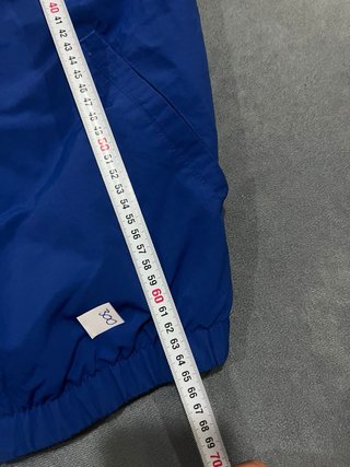 Chaqueta deportiva Adidas roja y azul