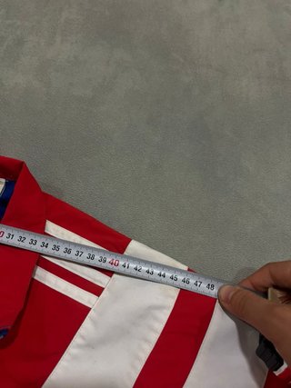 Chaqueta deportiva Adidas roja y azul