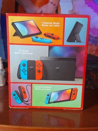 Nintendo Switch Oled con Joy-Con Azul y Rojo