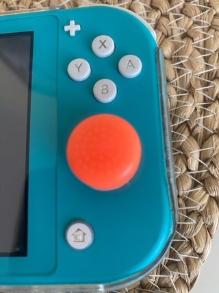 Nintendo Switch Lite Azul con Accesorios Naranja