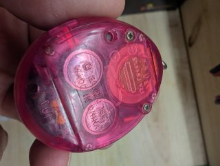 Tamagotchi Rosa Bandai sin baterias