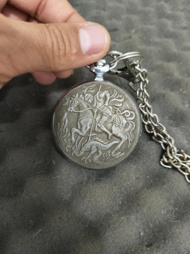 Reloj de bolsillo con cadena
