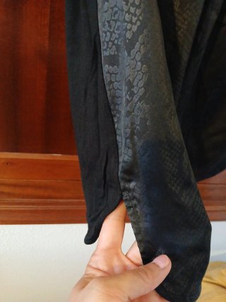 Blusa negra sin mangas talla M