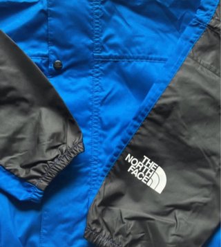 Giacca leggera The North Face blu e nera