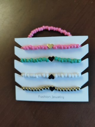 Conjunto 4 pulseras nuevas a estrenar
