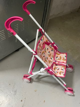 Sillita de paseo para muñecas.