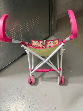 Sillita de paseo para muñecas.