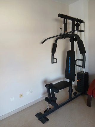 Máquina de gimnasio con discos