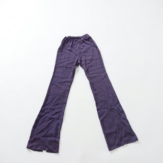 Pantalones acampanados satinados con aberturas