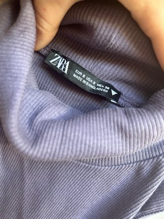 Top de cuello alto sin mangas