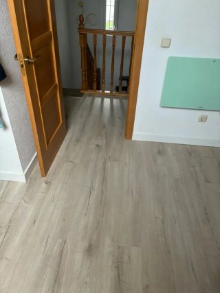 Instalación Tarima Laminada y Suelo Vinílico.