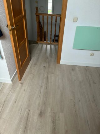 Instalación Tarima Laminada y Suelo Vinílico.