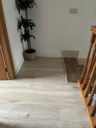 Instalación Tarima Laminada y Suelo Vinílico.