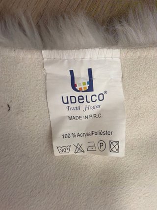 Alfombra pelo blanco y marrón