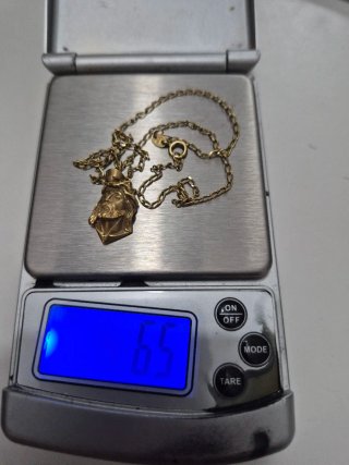 Cadena y dije rostro de Cristo oro 18k 750.