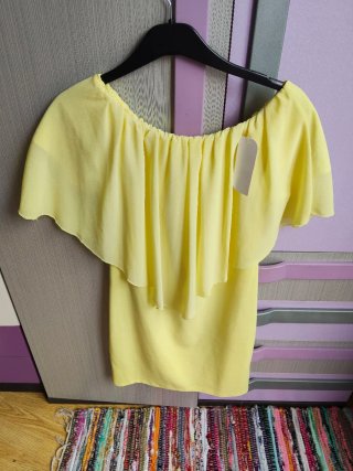 Lote 2 vestiti gialli. T. S/M