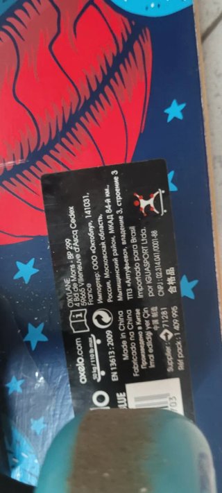 Monopatín Oxelo con diseño de oso