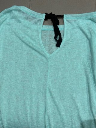 Jersey fino azul turquesa con lazo