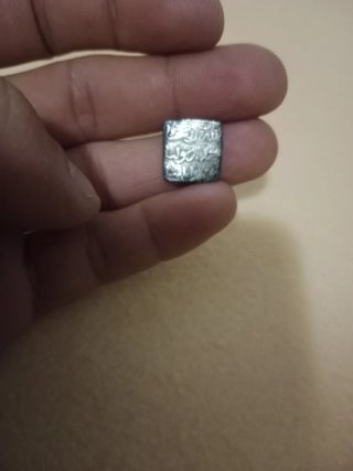 Moneda antigua de plata árabe