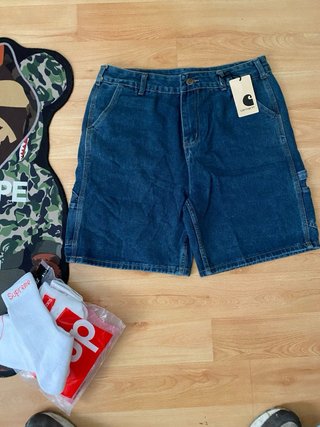 Vaqueros Carhartt + Calcetines Supreme