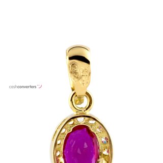 colgante oro 18k con piedra con rubi