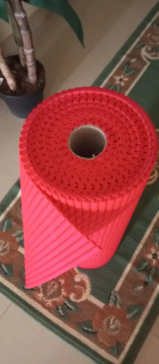 Rollo material rojo texturizado