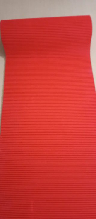 Rollo material rojo texturizado