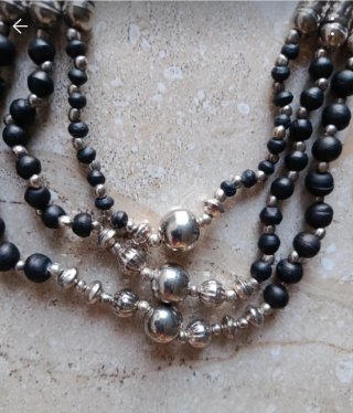 Collana etnica multistrato nera e argento