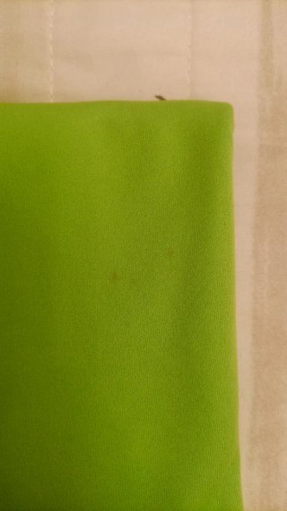 Copricostume verde multiuso