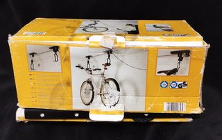 Sistema elevación bicicleta techo
