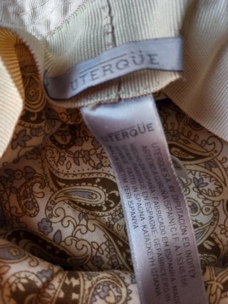 Sombrero Uterque beige ala ancha