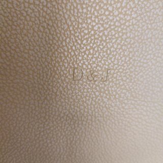 Bolso de hombro beige y marrón