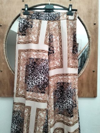 Pantaloni larghi fantasia oro e beige