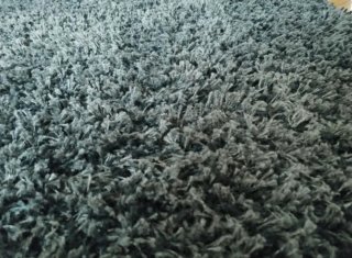 Alfombra pelo gris