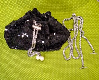 Borsetta paillettes nera con perle