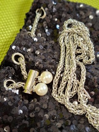 Borsetta paillettes nera con perle