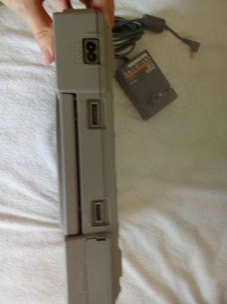 Consola PlayStation 1 + transformador original.
