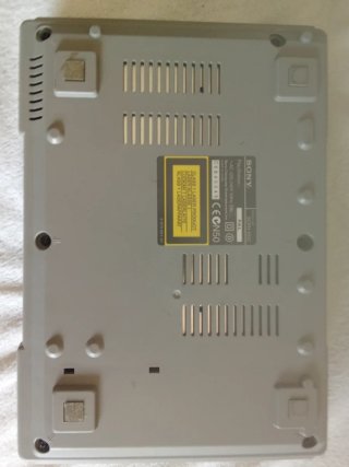 Consola PlayStation 1 + transformador original.